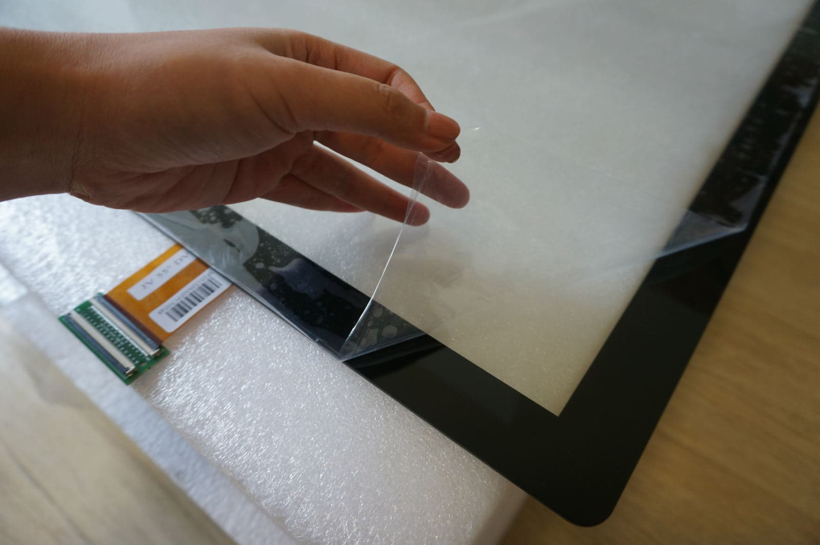 Large format projected capacitive touch screens